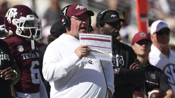Texas A&M Aggies head coach Mike Elko reacts on the sideline during the second quarter against the South Carolina Gamecocks. Texas A&M Aggies head coach Mike Elko reacts on the sideline during the second quarter against the South Carolina Gamecocks.