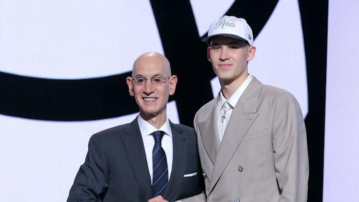 Jun 25, 2025; Brooklyn, NY, USA; Egor Demin stands with NBA commissioner Adam Silver after being selected as the eighth pick by the Brooklyn Nets in the first round of the 2025 NBA Draft at Barclays Center. Mandatory Credit: Brad Penner-Imagn Images Jun 25, 2025; Brooklyn, NY, USA; Egor Demin stands with NBA commissioner Adam Silver after being selected as the eighth pick by the Brooklyn Nets in the first round of the 2025 NBA Draft at Barclays Center. Mandatory Credit: Brad Penner-Imagn Images