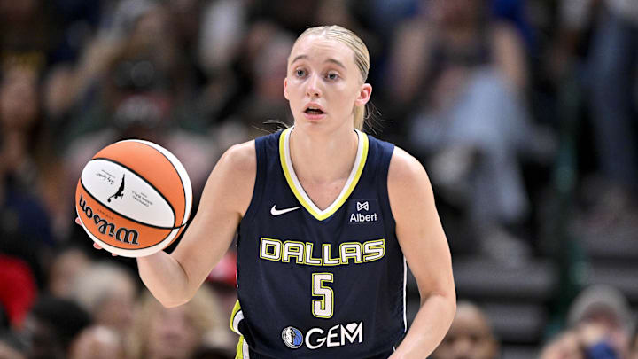 Jun 27, 2025; Dallas, Texas, USA; Dallas Wings guard Paige Bueckers (5) brings the ball up court against the Indiana Fever during the game at the American Airlines Center. Mandatory Credit: Jerome Miron-Imagn Images