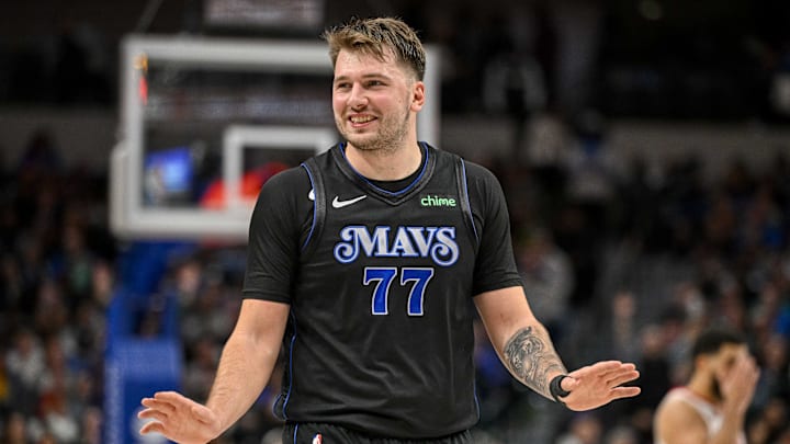 Nov 28, 2023; Dallas, Texas, USA; Dallas Mavericks guard Luka Doncic (77) reacts to a foul call against the Houston Rockets during the second half at the American Airlines Center. Mandatory Credit: Jerome Miron-Imagn Images