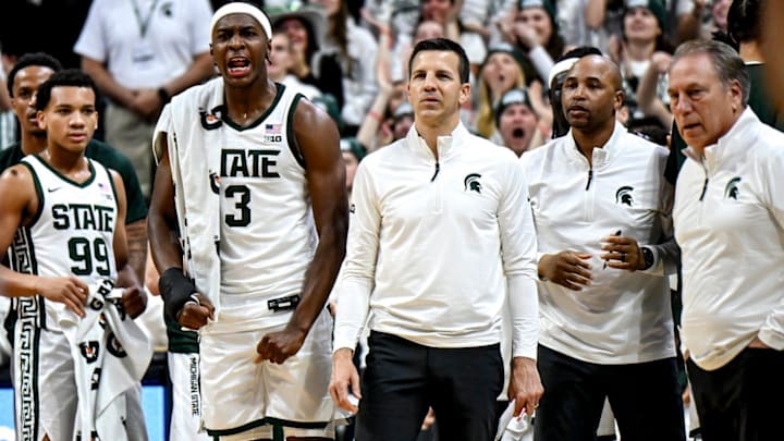 Michigan State's Cam Ward, center, celebrates after teammate Jordan Scott draws a Duke foul during the first half on Saturday, Dec. 6, 2025, at the Breslin Center in East Lansing.