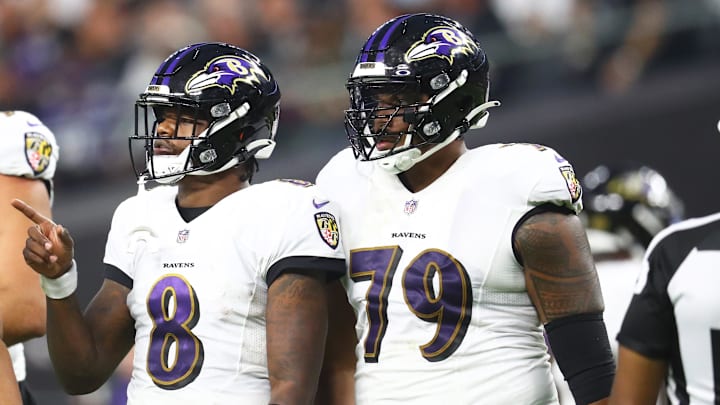Sep 13, 2021; Paradise, Nevada, USA; Baltimore Ravens quarterback Lamar Jackson (8) and offensive tackle Ronnie Stanley (79) against the Las Vegas Raiders during Monday Night Football at Allegiant Stadium. Mandatory Credit: Mark J. Rebilas-Imagn Images
