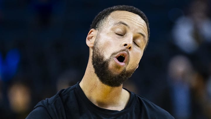 Dec 20, 2025; San Francisco, California, USA; Golden State Warriors guard Stephen Curry (30) reacts during warmups before the game against the Phoenix Suns at Chase Center. Mandatory Credit: John Hefti-Imagn Images