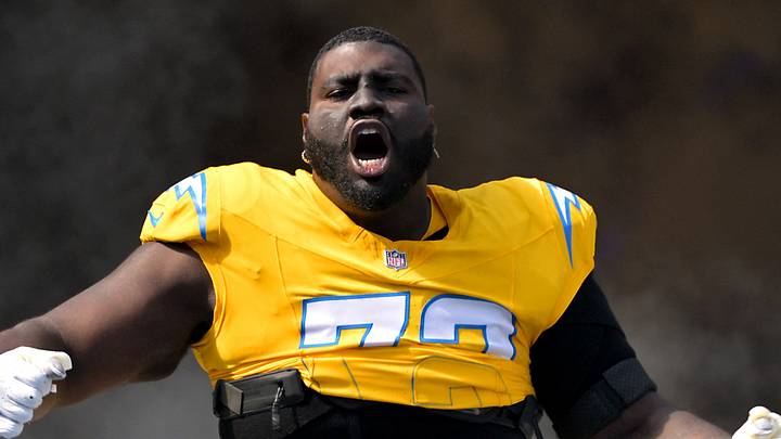 Oct 19, 2025; Inglewood, California, USA;  Los Angeles Chargers guard Mekhi Becton (73) runs on to the the field for the game against the Indianapolis Colts at SoFi Stadium. Mandatory Credit: Jayne Kamin-Oncea-Imagn Images
