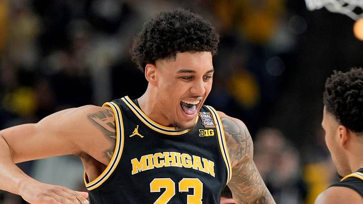 Michigan forward Yaxel Lendeborg (23) celebrates a play with Michigan guard Trey McKenney (1) in the first half of their Final Four game at Lucas Oil Stadium in Indianapolis on Saturday, April 4, 2026. Michigan forward Yaxel Lendeborg (23) celebrates a play with Michigan guard Trey McKenney (1) in the first half of their Final Four game at Lucas Oil Stadium in Indianapolis on Saturday, April 4, 2026.