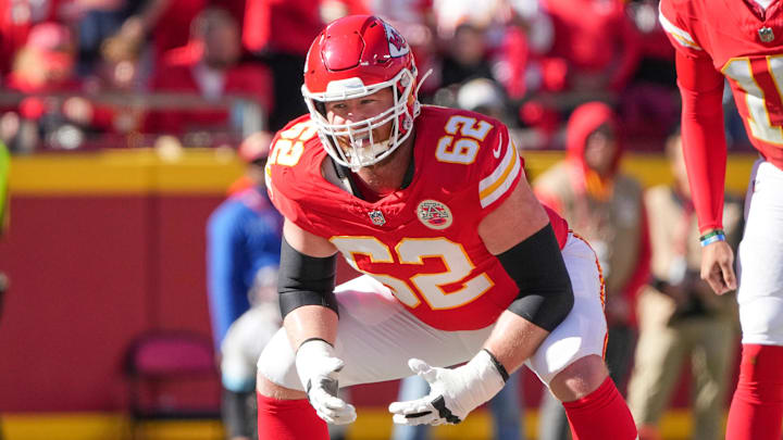 Nov 10, 2024; Kansas City, Missouri, USA; Kansas City Chiefs guard Joe Thuney (62) at the line of scrimmage against the Denver Broncos during the game at GEHA Field at Arrowhead Stadium. Mandatory Credit: Denny Medley-Imagn Images