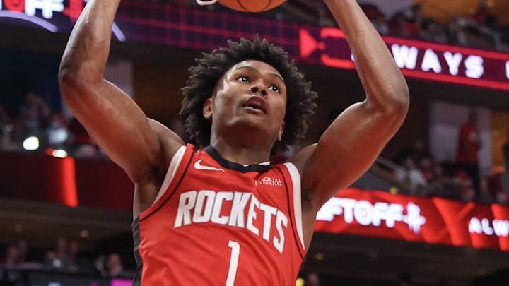 Apr 30, 2025; Houston, Texas, USA; Houston Rockets forward Amen Thompson (1) dunks against the Golden State Warriors in the fourth quarter during game five of first round for the 2025 NBA Playoffs at Toyota Center. Mandatory Credit: Thomas Shea-Imagn Images