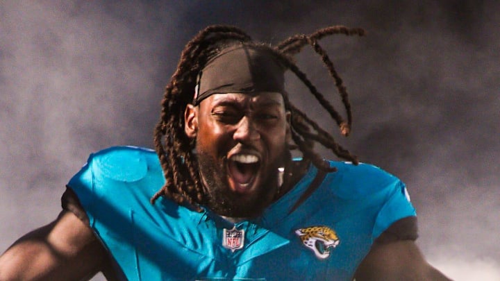 Jacksonville Jaguars linebacker Devin Lloyd (0) enters the stadium before an NFL football game 