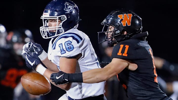 West De Pere High School's Braylon Stegall (11) breaks up a pass intended for Bay Port's Casey Jacobson (16) on Friday, October 10, 2025 .Tork Mason/USA TODAY NETWORK-Wisconsin