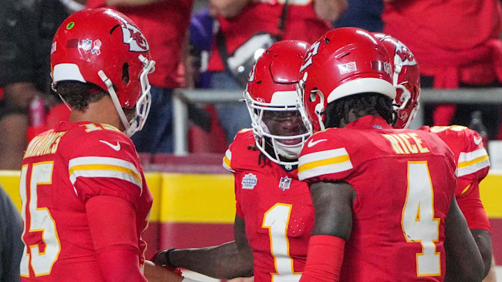 Sep 5, 2024; Kansas City, Missouri, USA; Kansas City Chiefs wide receiver Xavier Worthy (1) celebrates with quarterback Patrick Mahomes (15) and wide receiver Rashee Rice (4) after scoring a touchdown against the Baltimore Ravens during the game at GEHA Field at Arrowhead Stadium. Mandatory Credit: Denny Medley-Imagn Images