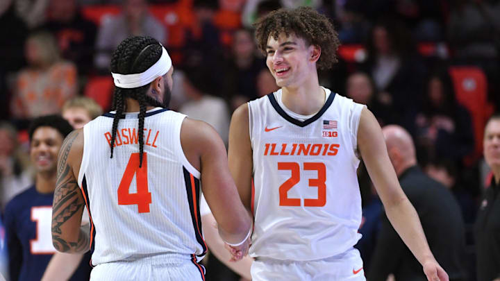 Dec 29, 2025; Champaign, Illinois, USA;  Illinois Fighting Illini guard Keaton Wagler (23) and teammate Kylan Boswell (4) react in the closing minutes of the second half against the Southern University Jaguars  at State Farm Center. Mandatory Credit: Ron Johnson-Imagn Images