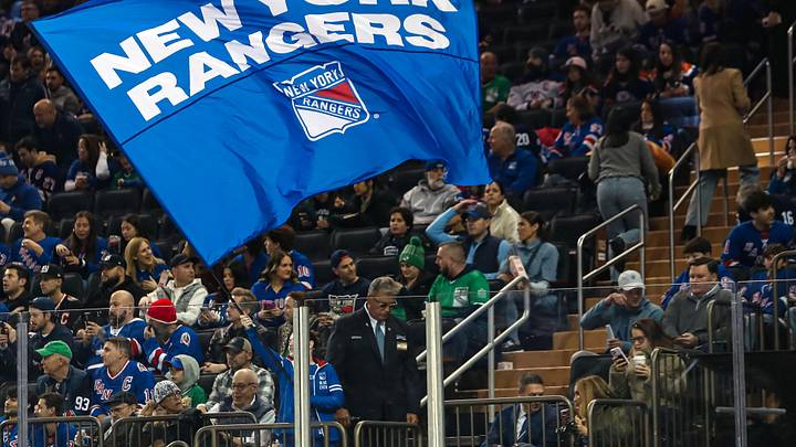 Mar 16, 2025; New York, New York, USA; A New York Rangers flag is seen in the crown during the first period against the Edmonton Oilers at Madison Square Garden. Mar 16, 2025; New York, New York, USA; A New York Rangers flag is seen in the crown during the first period against the Edmonton Oilers at Madison Square Garden.