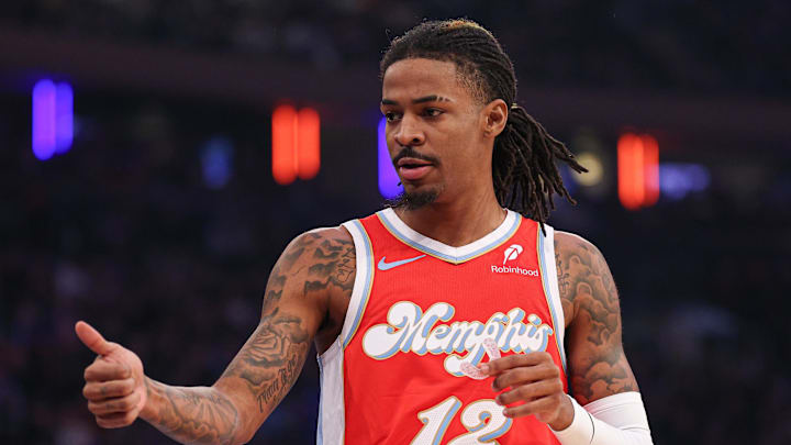 Jan 27, 2025; New York, New York, USA; Memphis Grizzlies guard Ja Morant (12) reacts during the first half against the New York Knicks at Madison Square Garden. Mandatory Credit: Vincent Carchietta-Imagn Images