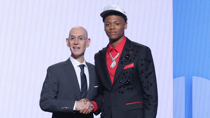 Ace Bailey stands with NBA commissioner Adam Silver
