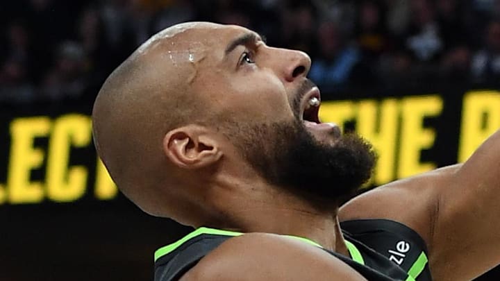 Apr 18, 2026; Denver, Colorado, USA; Minnesota Timberwolves center Rudy Gobert (27) scores in the lane during the first half against the Denver Nuggets in game one of the first round of the 2026 NBA Playoffs at Ball Arena. Mandatory Credit: Christopher Hanewinckel-Imagn Images