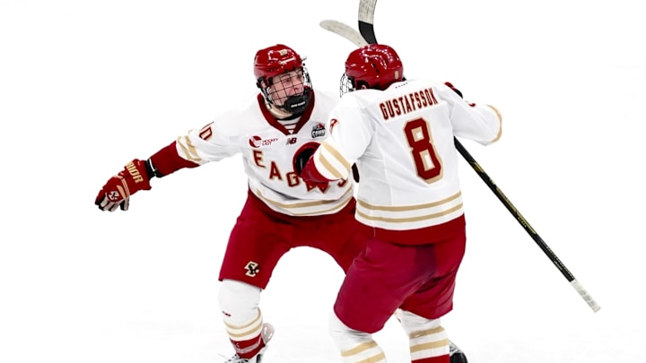 Lukas Gustafsson celebrates with James Hagens after scoring a goal at TD Garden on Feb. 9, 2026.