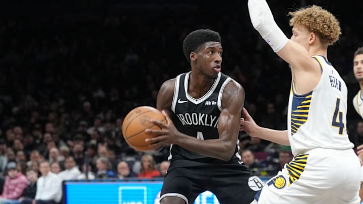 Apr 9, 2026; Brooklyn, New York, USA; Brooklyn Nets guard Drake Powell (4) looks to make a move on Indiana Pacers guard Taelon Peter (4) during the first half at Barclays Center. Mandatory Credit: Gregory Fisher-Imagn Images