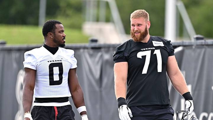 Jun 9, 2026; Houston, Texas, USA; Houston Texans linebacker Azeez al-Shaair, left, and offensive tackle Braden Smith, right, arrive for the team’s minicamp at Houston Methodist Training Center. Mandatory Credit: Maria Lysaker-Imagn Images