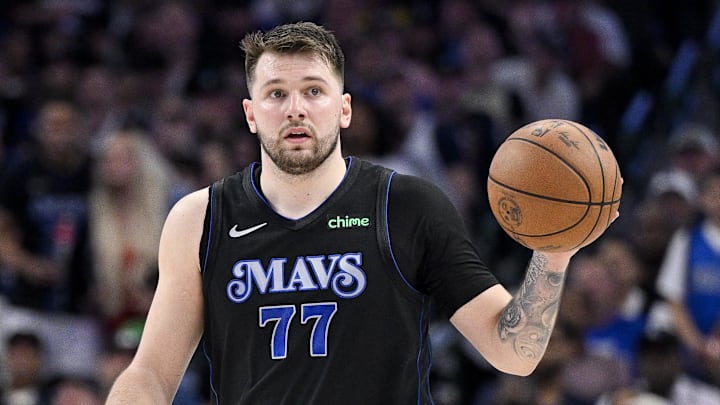 May 3, 2024; Dallas, Texas, USA; Dallas Mavericks guard Luka Doncic (77) brings the ball up court vs. the Los Angeles Clippers. May 3, 2024; Dallas, Texas, USA; Dallas Mavericks guard Luka Doncic (77) brings the ball up court vs. the Los Angeles Clippers.