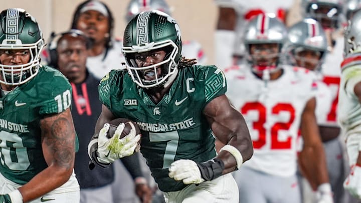 Michigan State Spartans linebacker Jordan Turner (7) recovers the fumble during the second quarter the NCAA football game against Ohio State University at Spartan Stadium in East Lansing, Saturday, Sept. 28, 2024.
