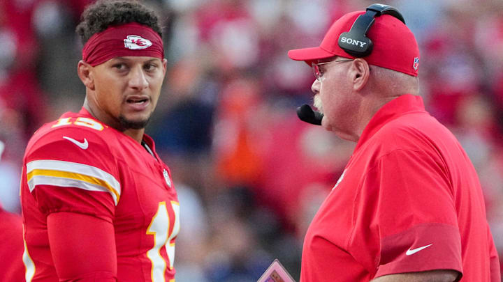 Kansas City Chiefs quarterback Patrick Mahomes (15) talks with head coach Andy Reid after a play against the Chicago Bears during the first half of the game at GEHA Field at Arrowhead Stadium. Mandatory Credit: Denny Medley-Imagn Images