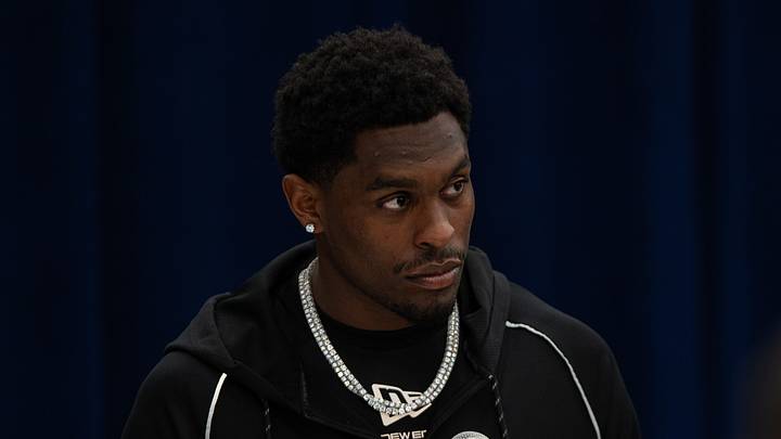Feb 27, 2026; Indianapolis, IN, USA; Oregon wideout Malik Benson (W006) speaks to members of the media during the NFL Combine at the Indiana Convention Center. Feb 27, 2026; Indianapolis, IN, USA; Oregon wideout Malik Benson (W006) speaks to members of the media during the NFL Combine at the Indiana Convention Center.