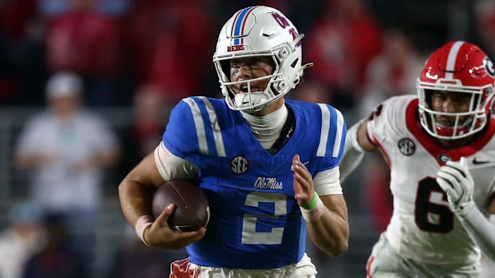 Nov 9, 2024; Oxford, Mississippi, USA; Mississippi Rebels quarterback Jaxson Dart (2) runs the ball during the second half against the Georgia Bulldogs at Vaught-Hemingway Stadium. Mandatory Credit: Petre Thomas-Imagn Images Nov 9, 2024; Oxford, Mississippi, USA; Mississippi Rebels quarterback Jaxson Dart (2) runs the ball during the second half against the Georgia Bulldogs at Vaught-Hemingway Stadium. Mandatory Credit: Petre Thomas-Imagn Images