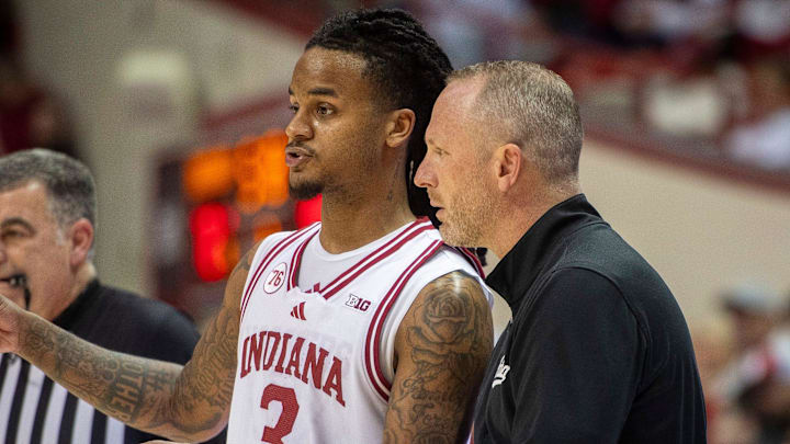 Indiana's Lamar Wilkerson (3) talks with Head Coach Darian DeVries during the Indiana versus Chicago State men's basketball game at Simon Skjodt Assembly Hall on Saturday, Dec. 20, 2025.