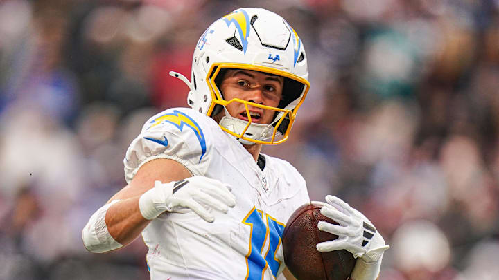 Dec 28, 2024; Foxborough, Massachusetts, USA; Los Angeles Chargers wide receiver Ladd McConkey (15) makes the touchdown catch against the New England Patriots in the third quarter at Gillette Stadium. Mandatory Credit: David Butler II-Imagn Images