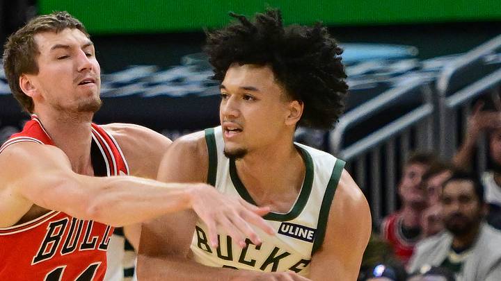 Oct 14, 2026; Milwaukee, Wisconsin, USA;  Milwaukee Bucks guard Brayden Burries (0) gets pressure from Chicago Bulls forward Matas Buzelis (14) in the first quarter at Fiserv Forum.  Mandatory Credit: Benny Sieu-Imagn Images