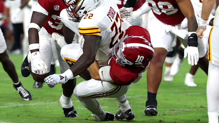 Sep 6, 2025; Tuscaloosa, Alabama, USA; Louisiana Monroe Warhawks running back D'Shaun Ford (22) is tackled by Alabama Crimson Tide defensive back Bray Hubbard (18) during the second half at Saban Field at Bryant-Denny Stadium. Mandatory Credit: David Leong-Imagn Images Sep 6, 2025; Tuscaloosa, Alabama, USA; Louisiana Monroe Warhawks running back D'Shaun Ford (22) is tackled by Alabama Crimson Tide defensive back Bray Hubbard (18) during the second half at Saban Field at Bryant-Denny Stadium. Mandatory Credit: David Leong-Imagn Images