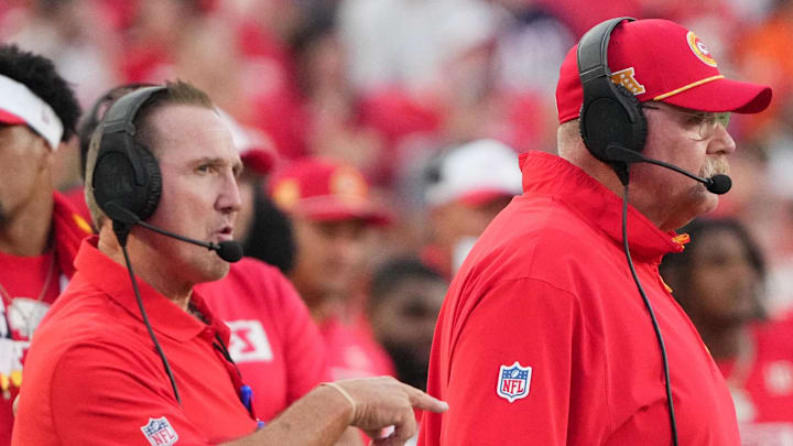 Aug 22, 2024; Kansas City, Missouri, USA; Kansas City Chiefs defensive coordinator Steve Spagnuolo, left and head coach Andy Reid watch play against the Chicago Bears during the game at GEHA Field at Arrowhead Stadium. Mandatory Credit: Denny Medley-Imagn Images