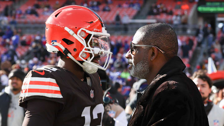 Dec 21, 2025; Cleveland, Ohio, USA;  Cleveland Browns quarterback Shedeur Sanders (12) with father Deion Sanders prior to a game against the Buffalo Bills at Huntington Bank Field. Mandatory Credit: Scott Galvin-Imagn Images