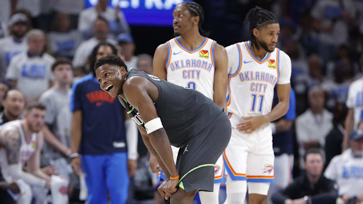 Minnesota Timberwolves guard Anthony Edwards smiles after a foul is called against him.