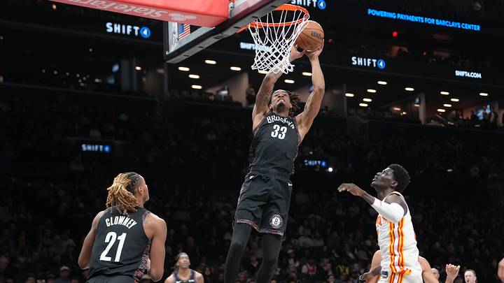 Apr 3, 2026; Brooklyn, New York, USA; Brooklyn Nets center Nic Claxton (33) dunks the ball against the Atlanta Hawks during the first half at Barclays Center. Mandatory Credit: Gregory Fisher-Imagn Images