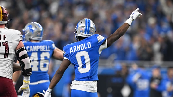 Detroit Lions corner back Terrion Arnold (0) celebrates after a fourth down stop against the Washington Commanders 