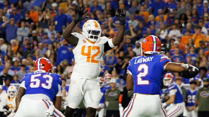 Tennessee Volunteers defensive lineman Tyre West (42) attempts to block a pass from Florida Gators quarterback DJ Lagway (2) Tennessee Volunteers defensive lineman Tyre West (42) attempts to block a pass from Florida Gators quarterback DJ Lagway (2)