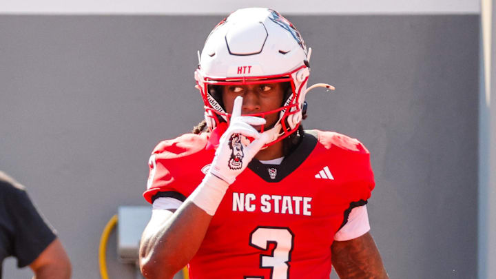 Oct 4, 2025; Raleigh, North Carolina, USA;  NC State Wolfpack running back Hollywood Smothers (3) celebrates a touchdown during the first half of the game against Campbell Fighting Camels at Carter-Finley Stadium. Mandatory Credit: Jaylynn Nash-Imagn Images