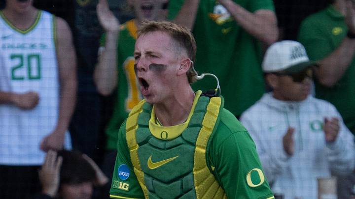 Oregon catcher Burke-Lee Mabeus celebrates an out at the plate against Oregon State on day three at the NCAA Eugene Regional Tournament at PK Park in Eugene May 31, 2026.