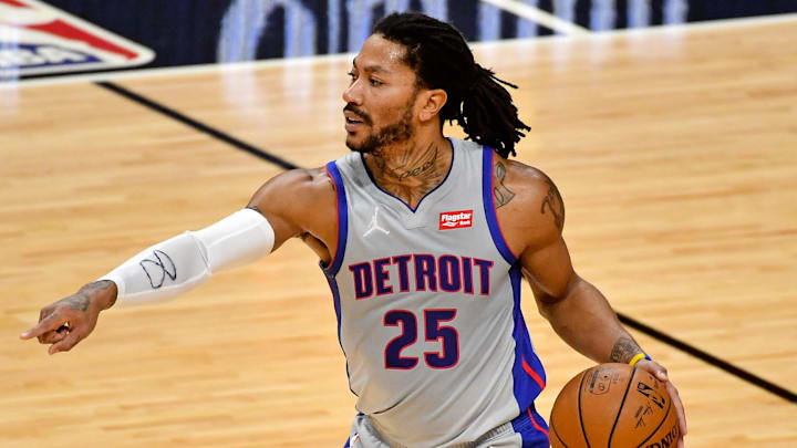 Jan 18, 2021; Miami, Florida, USA; Detroit Pistons guard Derrick Rose (25) controls the ball against the Miami Heat during the first half at American Airlines Arena. Mandatory Credit: Jasen Vinlove-Imagn Images