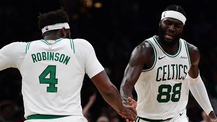 Oct 14, 2026; Boston, Massachusetts, USA;  Boston Celtics center Neemias Queta (88) is congratulated by Boston Celtics center Mitchell Robinson (4) after making a basket during the second half against the Charlotte Hornets at TD Garden. Mandatory Credit: Bob DeChiara-Imagn Images
