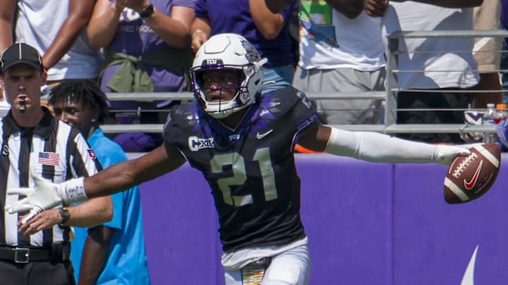 Sep 23, 2023; Fort Worth, Texas, USA; TCU Horned Frogs safety Bud Clark (21) celebrates after he intercepts an SMU Mustangs pass during the second half at Amon G. Carter Stadium.