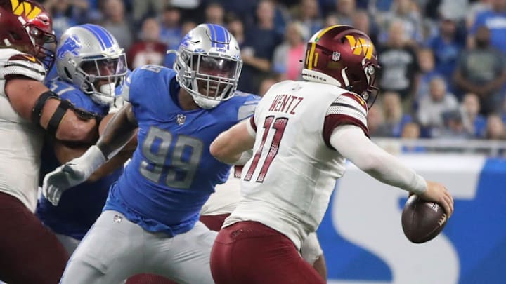 Julian Okwara pressures Carson Wentz in 2022.