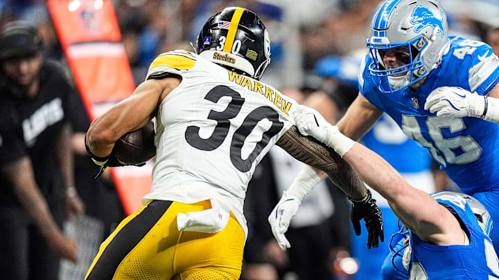 Detroit Lions linebacker Jack Campbell (46) tackles Pittsburgh Steelers running back Jaylen Warren (30) 