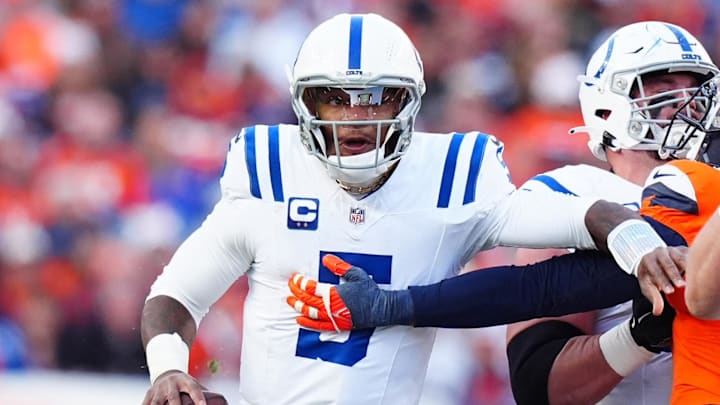 Dec 15, 2024; Denver, Colorado, USA; Denver Broncos linebacker Nik Bonitto (15) reaches for Indianapolis Colts quarterback Anthony Richardson (5) in the first half at Empower Field at Mile High. Mandatory Credit: Ron Chenoy-Imagn Images Dec 15, 2024; Denver, Colorado, USA; Denver Broncos linebacker Nik Bonitto (15) reaches for Indianapolis Colts quarterback Anthony Richardson (5) in the first half at Empower Field at Mile High. Mandatory Credit: Ron Chenoy-Imagn Images