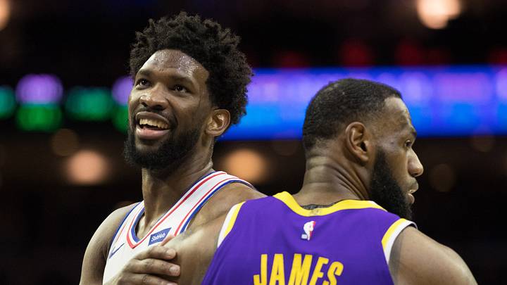 Feb 10, 2019; Philadelphia, PA, USA; Philadelphia 76ers center Joel Embiid (21) reacts with Los Angeles Lakers forward LeBron James (23) after a 76ers score during the fourth quarter at Wells Fargo Center. Feb 10, 2019; Philadelphia, PA, USA; Philadelphia 76ers center Joel Embiid (21) reacts with Los Angeles Lakers forward LeBron James (23) after a 76ers score during the fourth quarter at Wells Fargo Center.