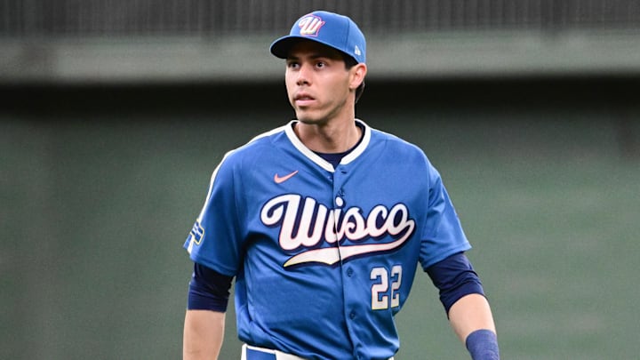 Apr 10, 2026; Milwaukee, Wisconsin, USA;  Milwaukee Brewers designated hitter Christian Yelich (22) warms up in the team's new City Connect uniform before game against the Washington Nationals at American Family Field. Mandatory Credit: Benny Sieu-Imagn Images