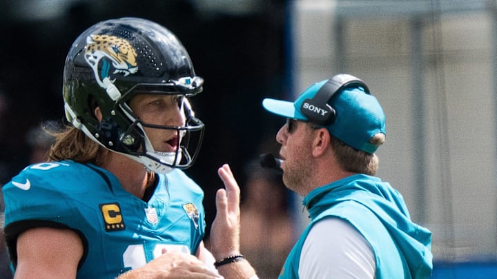 Jacksonville Jaguars quarterback Trevor Lawrence (16) and Carolina Panthers head coach Liam Coen has words during the second quarter of an NFL football game between the Carolina Panthers at Jacksonville Jaguars at EverBank Stadium Sunday September 7, 2025. [Doug Engle/Florida Times-Union]