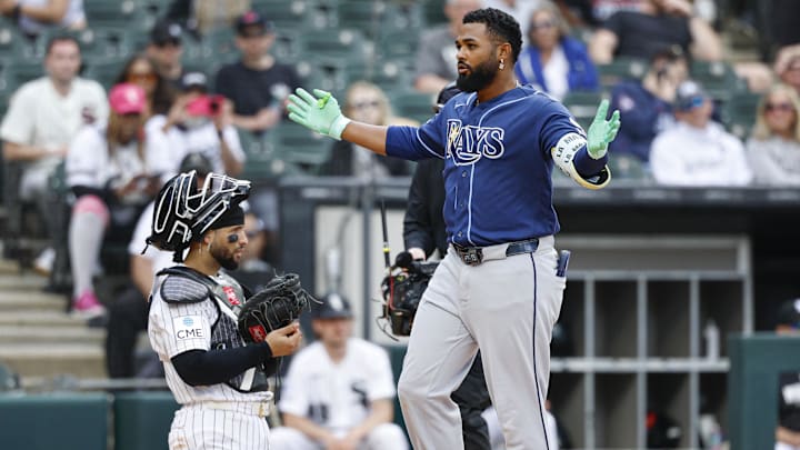 Apr 16, 2026; Chicago, Illinois, USA; Tampa Bay Rays third baseman Junior Caminero (13) celebrates as he crosses home plate after hitting a solo home run against the Chicago White Sox during the ninth inning at Rate Field. 