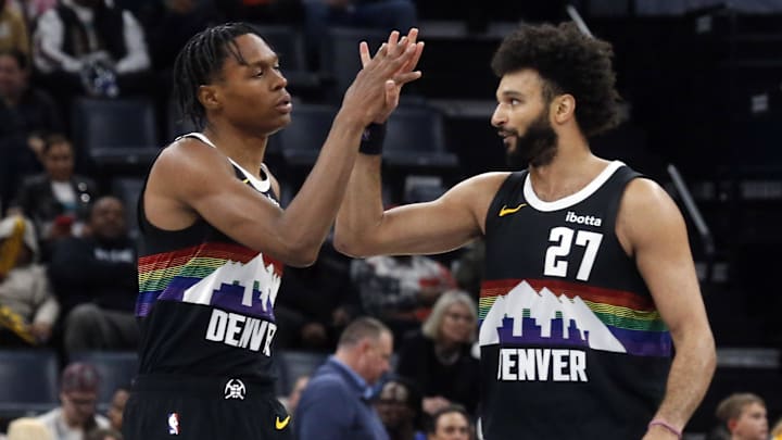 Nov 24, 2025; Memphis, Tennessee, USA; Denver Nuggets guard Peyton Watson (8) reacts with guard Jamal Murray (27) during the fourth quarter against the Memphis Grizzlies at FedExForum.